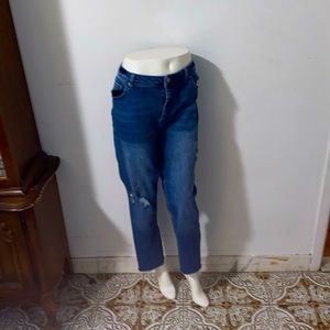 A blue wash, skinny stretchy, jeans, distressed look